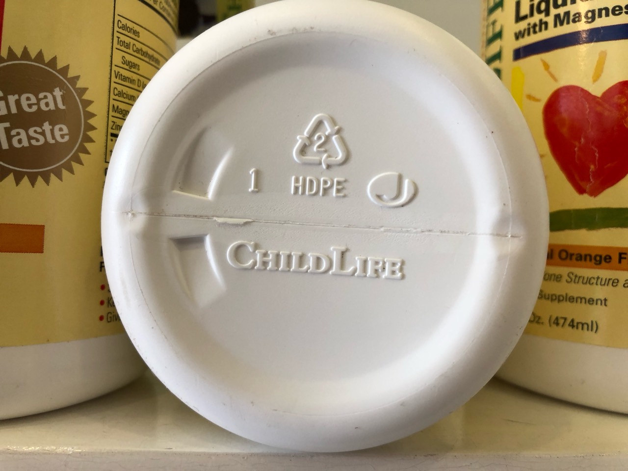Childlife liquid calcium and magnesium orange, 474ml: bổ sung canxi và magie cho bé chiều cao vượt trội